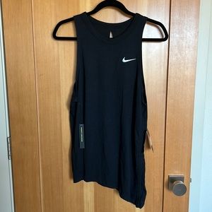 Super cute Nike open back tank with asymmetrical hemline.
